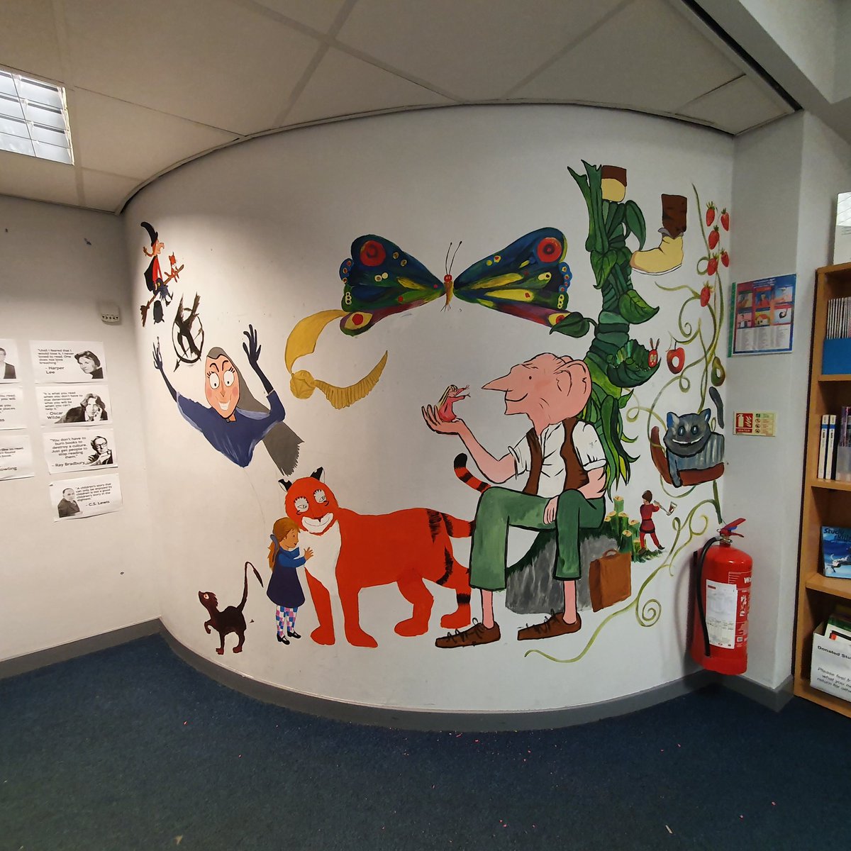 Still a work in progress but just had to share our library mural, created by our amazing @WACExpArts team and students.  Isn't it fab? @WhitburnAC @fvwlriclit @scottishbktrust @GreatSchLibs @LoveWestLothian #mural #favouritebooks #librarydisplay #painting