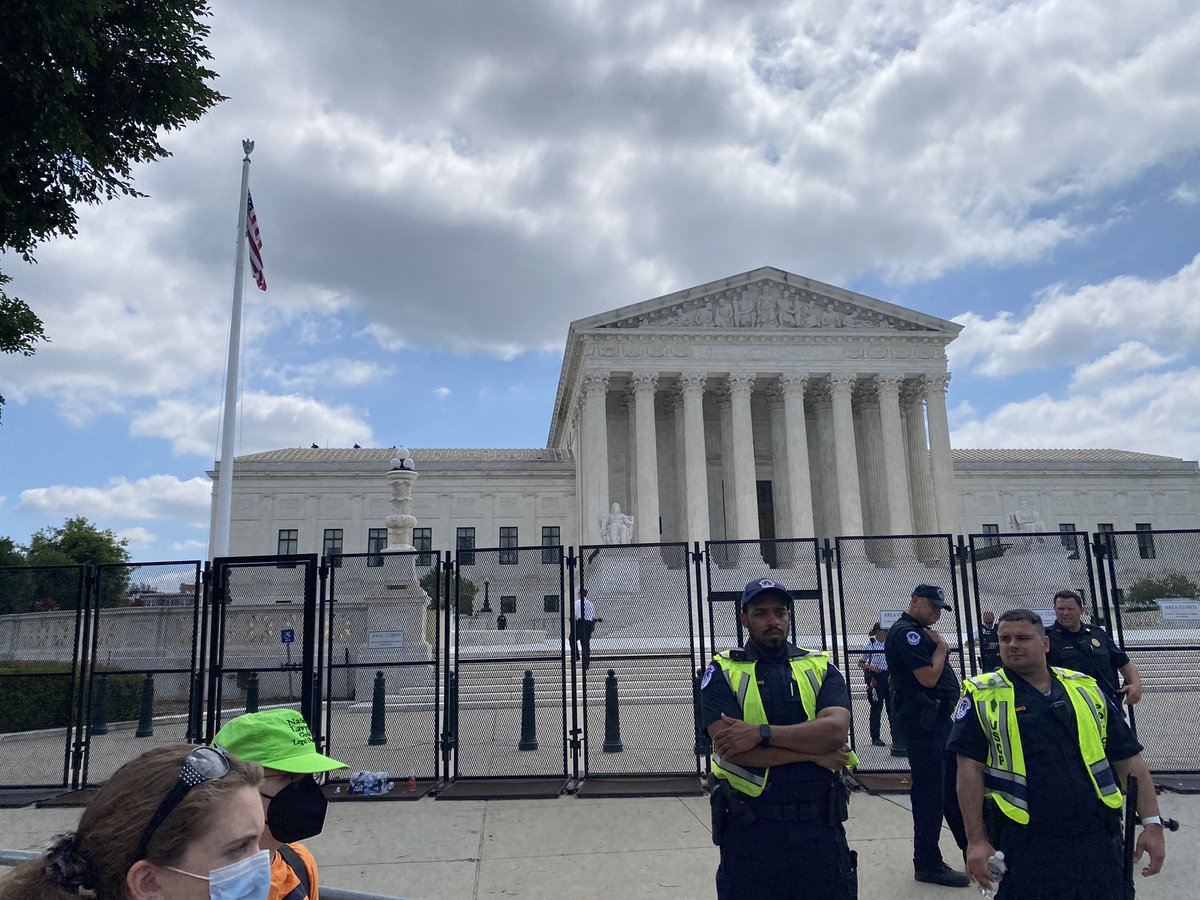 Snipers on the roof of the Supreme Court right now. Upper left.