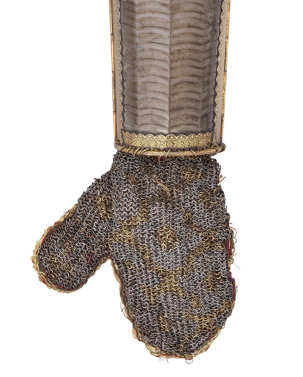 OlympiaAuctions's tweet photo. A fine Indo-Persian Arm Defence (Bazuband), late 17th/18th century, the gold decoration 19th century with an Urdu inscription to the distinguished swordsman, Alfred Hutton. #bazuband #auctionnextweek https://t.co/WXK3t2ekUA