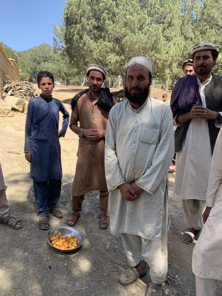 SecKermani's tweet photo. Afghan hospitality continues to astound:

At a remote village in Gayan, close to the earthquake’s epicentre, these men refused to let us leave before we had taken at least one apricot each

We tried our best to refuse, but they insisted despite their homes being destroyed 💚💚💚 https://t.co/knzXxNQ58w