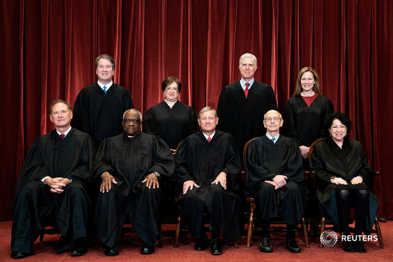 Reuters's tweet photo. The conservative-majority U.S. Supreme Court voted 5-4 to overturn Roe v. Wade after nearly 50 years. Here are some excerpts from their opinions: https://t.co/LzLbXbxEkJ https://t.co/d7O5yZgzN5