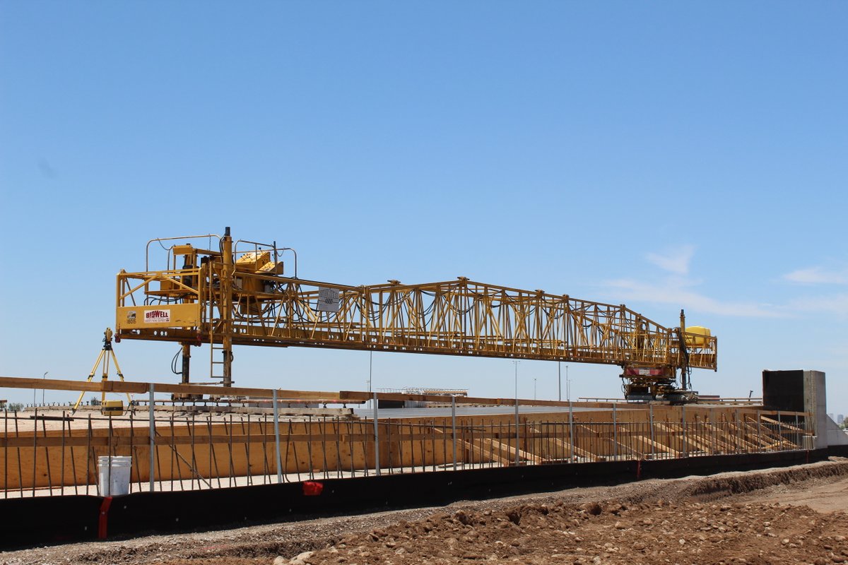 It’s a bird! It’s a plane! It’s the Bidwell! This colossal Bidwell machine placed a giant portion of concrete on top of a soffit fill. Workers will cast the box girders for the Broadway Road bridge in place on top of the slab. #FactFriday #AheadOfTheCurve