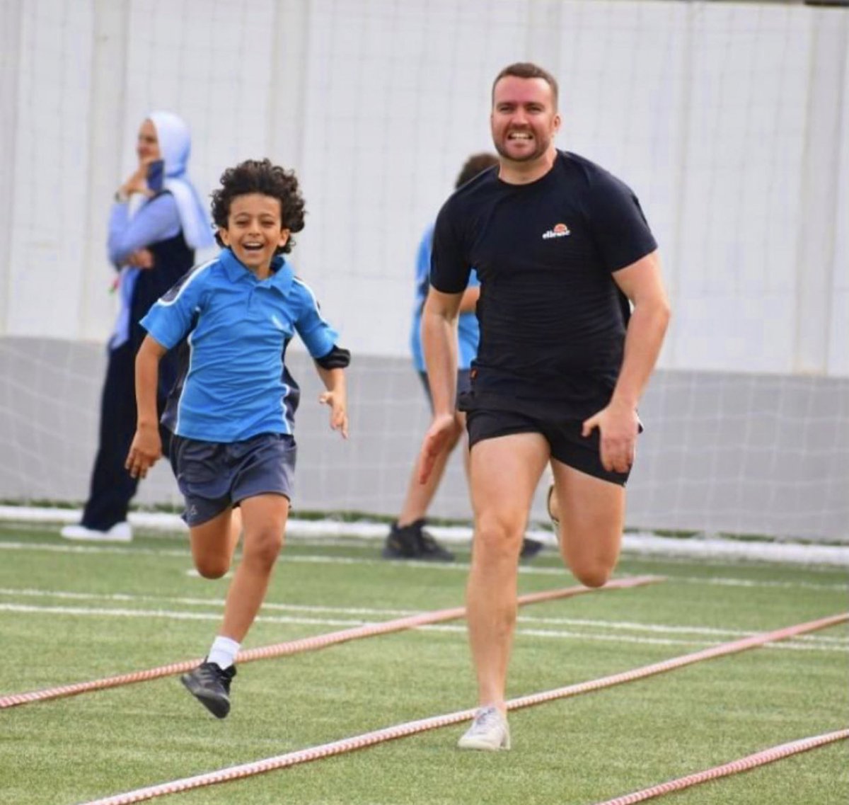 Throwback to sports day at the The Aquila School. Race of the Manchester City fans. As you can tell some of us found running in 40 degree heat easier than others. #sportsday #edutwitter <a href="/theaquilaschool/">The Aquila School</a>