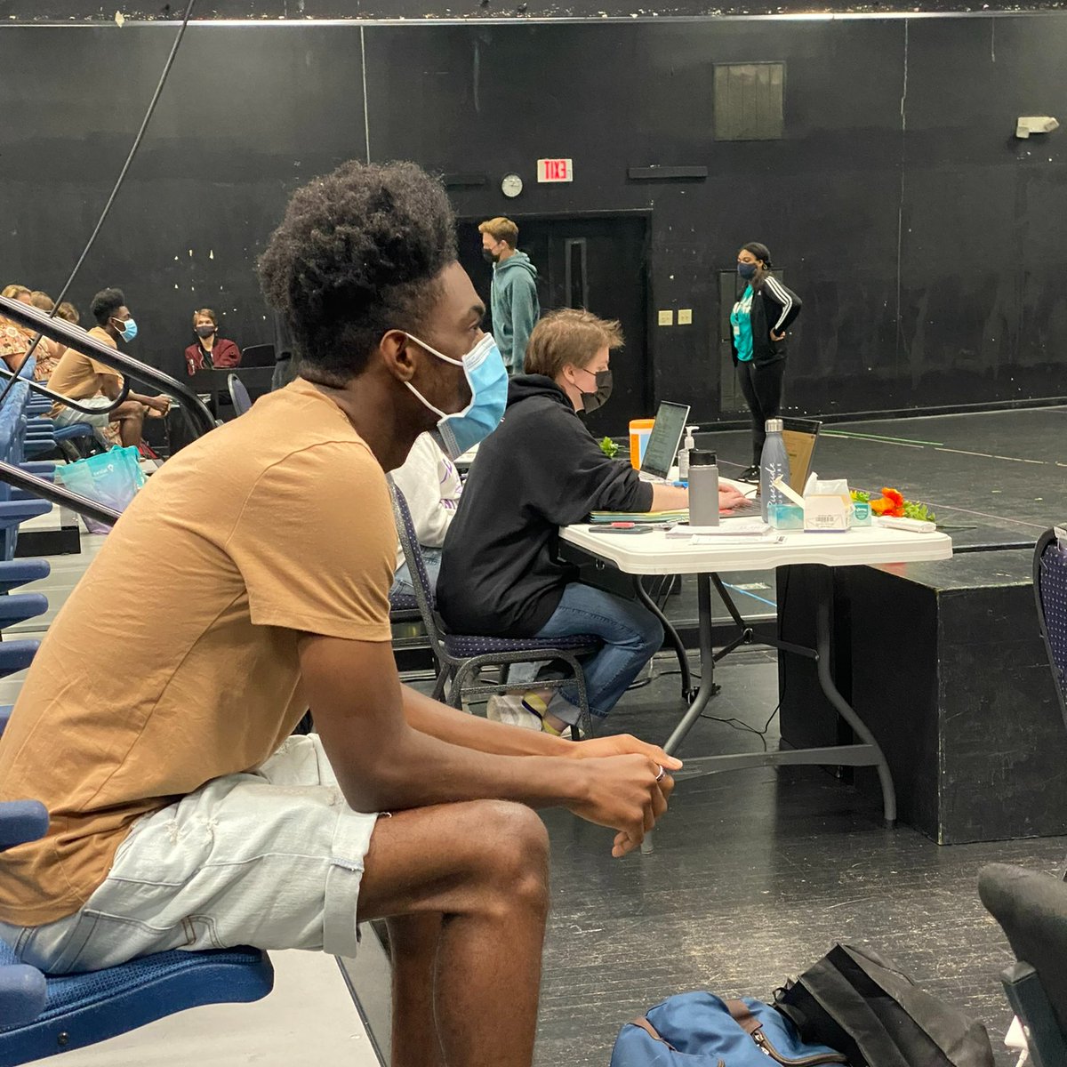 UnitedArtsWake's tweet photo. #HappyFriday Introducing Devon - one of our DIAL interns working at @nctheatre. Today he gave his fellow interns a behind the scenes tour & sneak peek at their upcoming show. Devon (light orange shirt & jean shorts) loves working with all the talented students! #DIALWake #DIAL22 https://t.co/lxs0nWUM5K