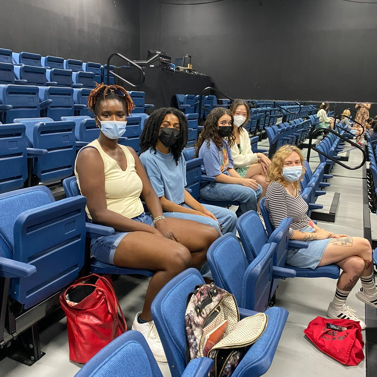 UnitedArtsWake's tweet photo. #HappyFriday Introducing Devon - one of our DIAL interns working at @nctheatre. Today he gave his fellow interns a behind the scenes tour & sneak peek at their upcoming show. Devon (light orange shirt & jean shorts) loves working with all the talented students! #DIALWake #DIAL22 https://t.co/lxs0nWUM5K