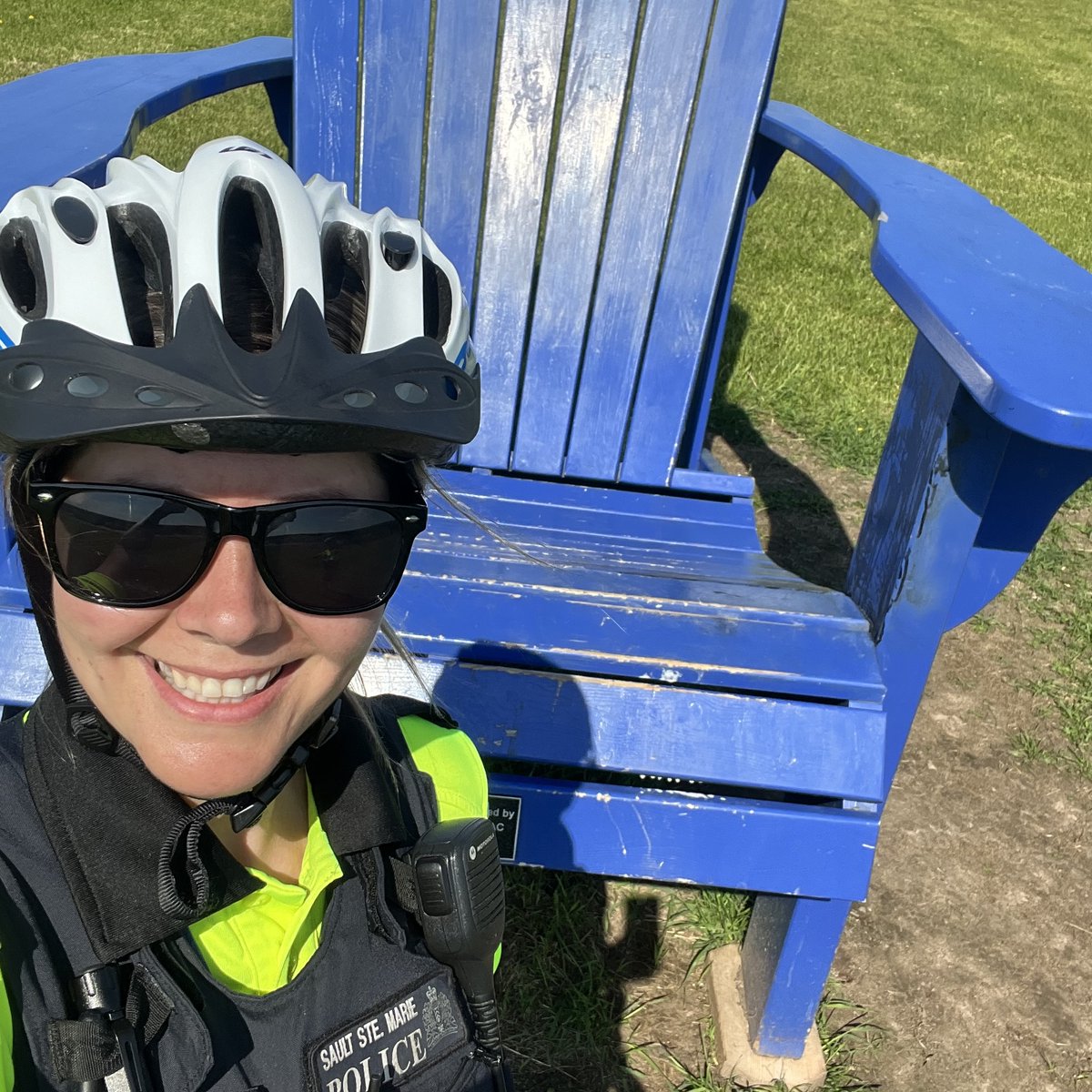 SaultPolice's tweet image. Another warm summer day in @cityssm and Cst. Houslander &amp;amp; Cst. Smith are taking the sites! #BigBlueChair #GiantTableandChairs #HubTrail
