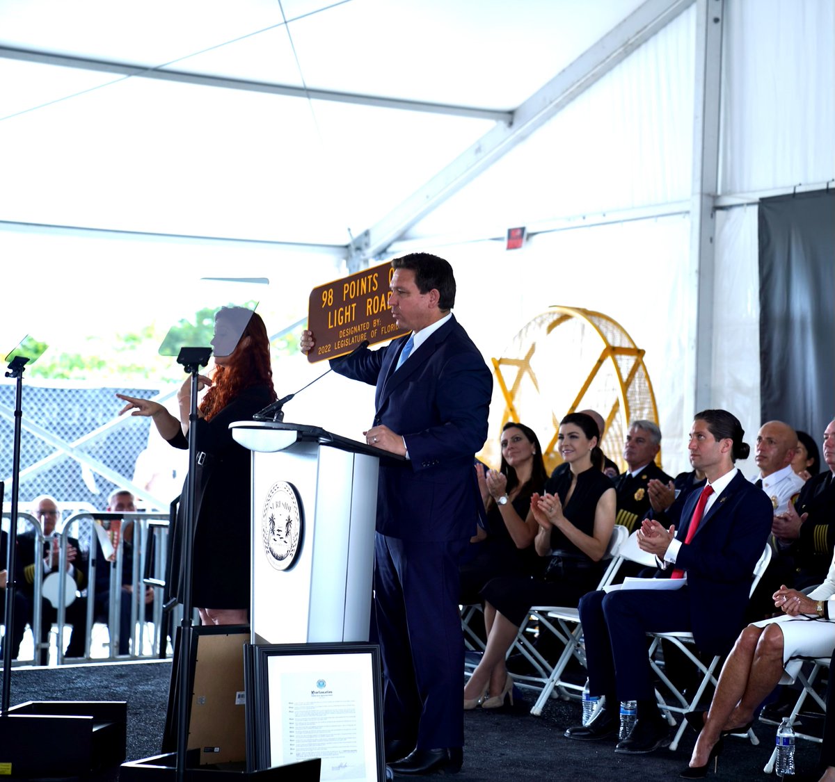 GovRonDeSantis's tweet photo. Starting July 1st, the road outside of Champlain Towers South will be renamed to “98 Points of Light Road” in honor of the 98 lives lost in the tower collapse. 

They left an incredible legacy and will always be remembered. https://t.co/oj0SU383QH