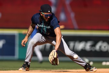 J.P. takes fielding practice before tonight's game. 