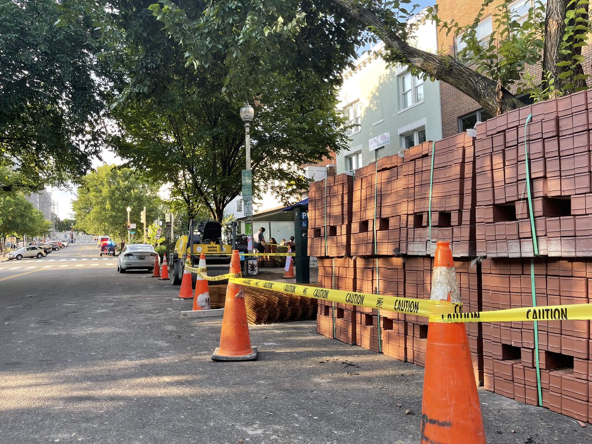 NoahLJennings's tweet photo. Why on earth would the city of DC leave 10 full pallets of bricks right down the street from the Capitol complex and across the street from the RNC? https://t.co/Ego5BkbUYo