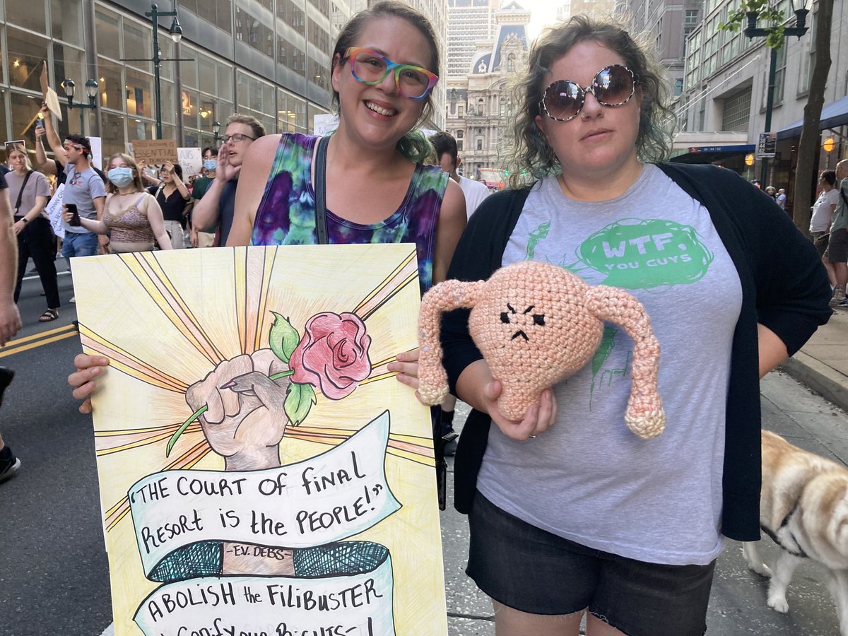 SammyCaiola's tweet photo. A chalked-up city hall, a crocheted uterus, and some pretty creative signs. Full story coming to ⁦@WHYYNews⁩ https://t.co/8xKpwBQJ0p