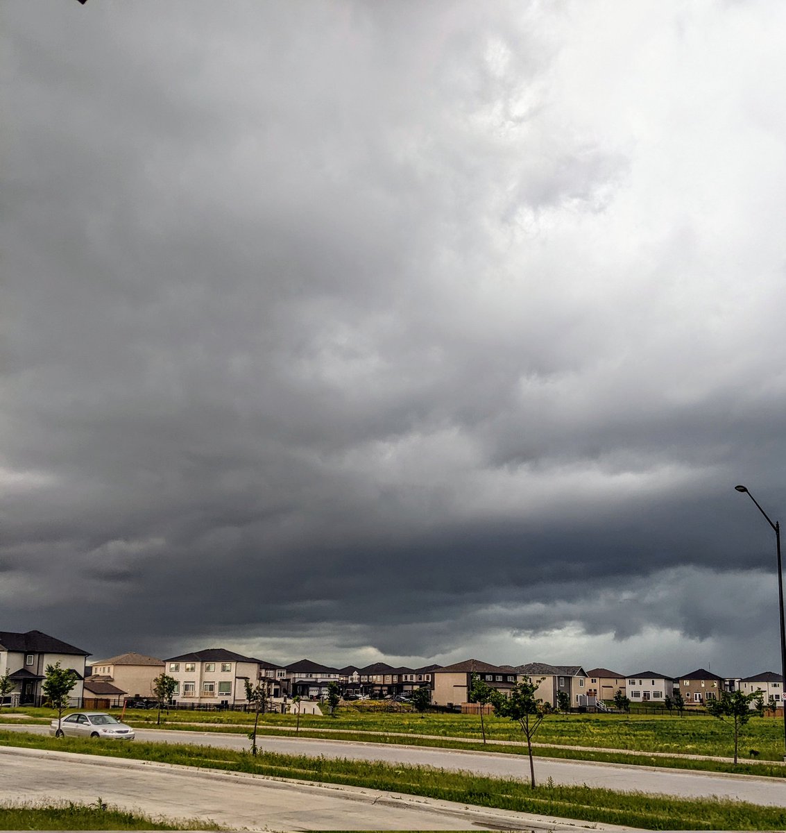 jen_wx's tweet photo. Earlier this evening (just before 5pm local time) east-southeast of Winnipeg. It had a decent couplet before it gusted out.#mbstorm https://t.co/yYffuBlxLo