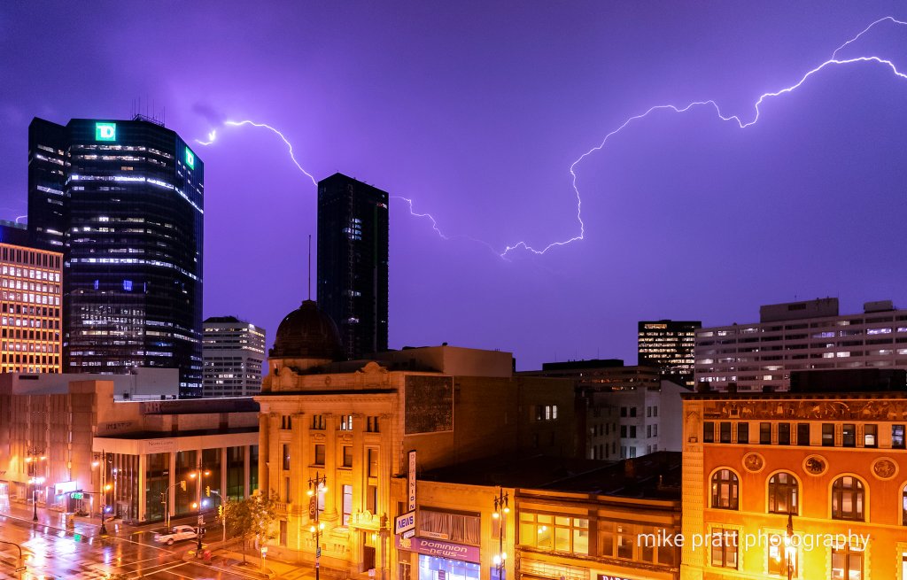 MikePrattPhotos's tweet photo. Stayed up for the pretty decent lightning over downtown last night. Happier with the results this time around than my previous attempt last year. #Winnipeg #mbstorm https://t.co/OroulAfcu8