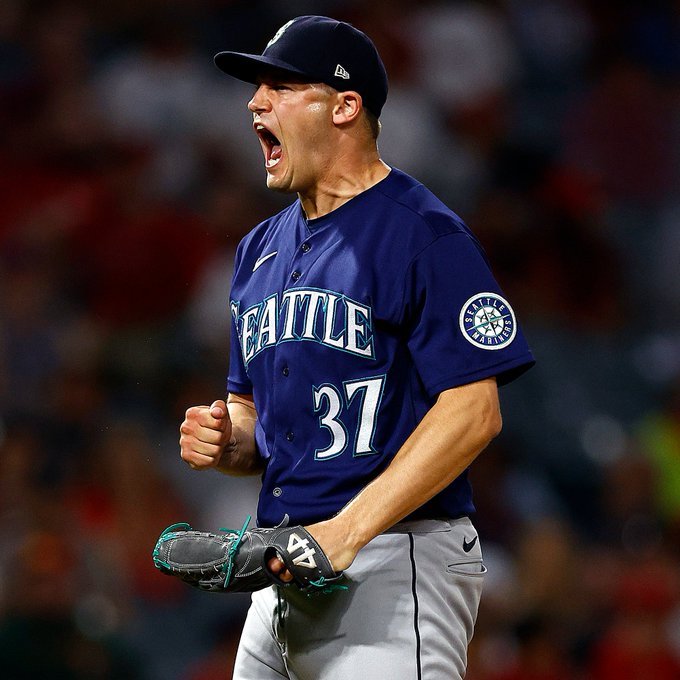 Paul Sewald screams in celebration after securing the save in Anaheim.
