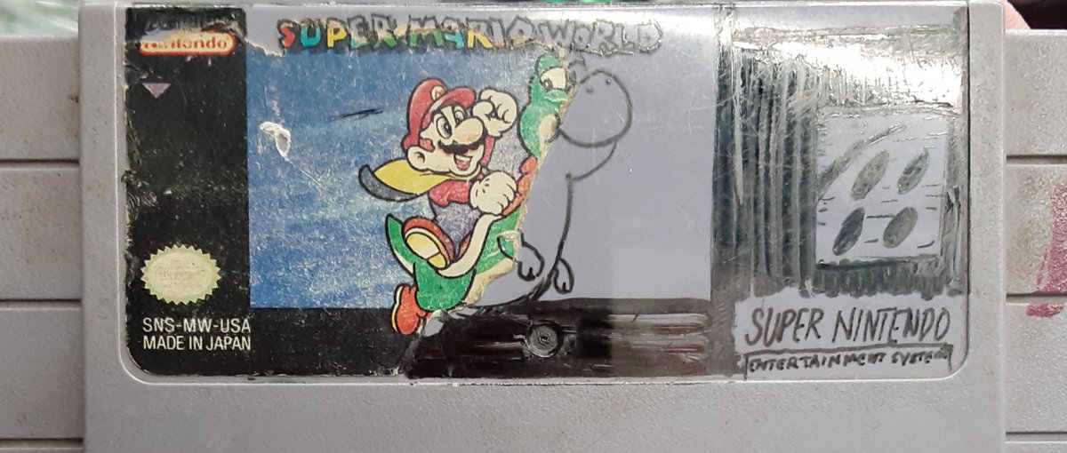 Super Mario World (SNES) (Most of left side is the original label)