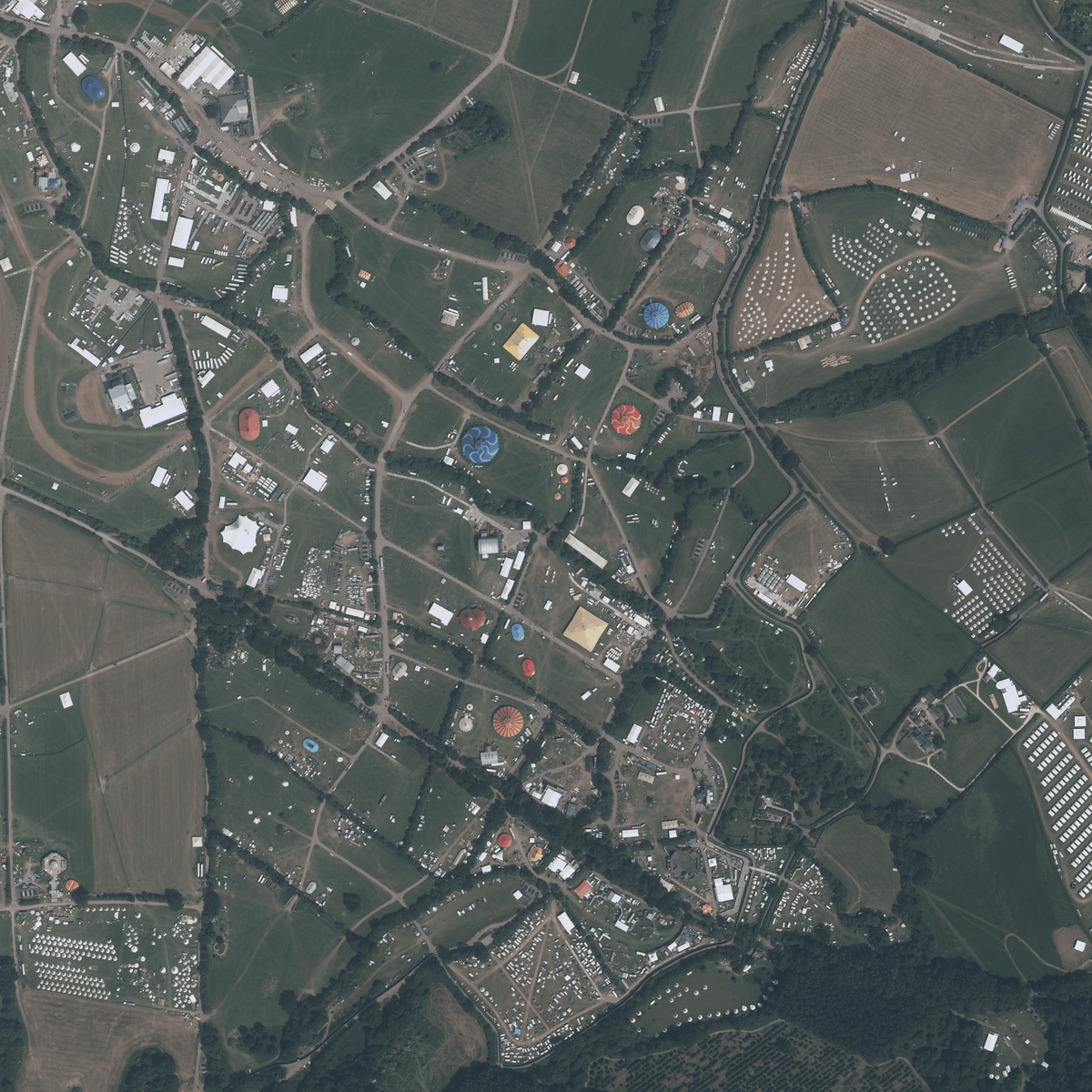 OrdnanceSurvey's tweet photo. Can you guess where our Flying Team has been?

This is what #Glastonbury, home of one of the most famous festivals in the UK looked like days ago when it was captured as part of the planned flying programme for the year. 

Learn more about our Flying Team: https://t.co/EQmfhyDSTh https://t.co/SfUxorAgpn