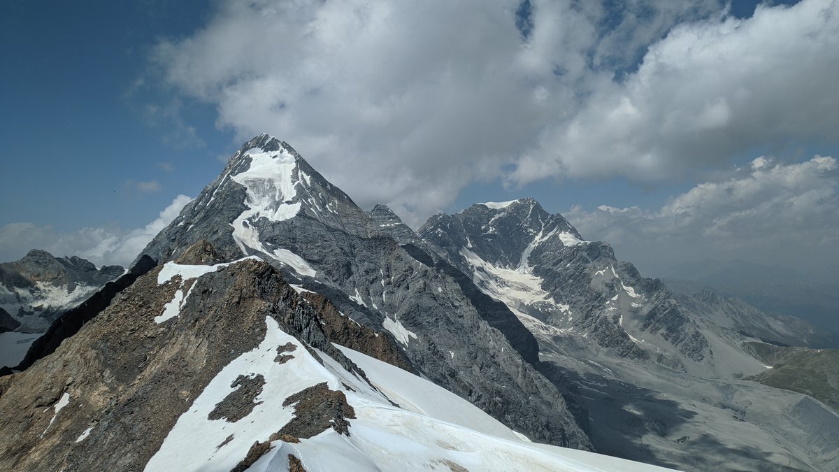 fil0's tweet photo. (1) The summit of Gran Zebrù in all its splendour, (2) overview of the Ortles-Cevedale group glacier with Rifugio Casati and Rifugio Guasti in the centre at bottom, pictures taken from Cima della Solda 3376m on 20 June. #hiking #alps #glacier #summit https://t.co/BXKjF0m6Uf
