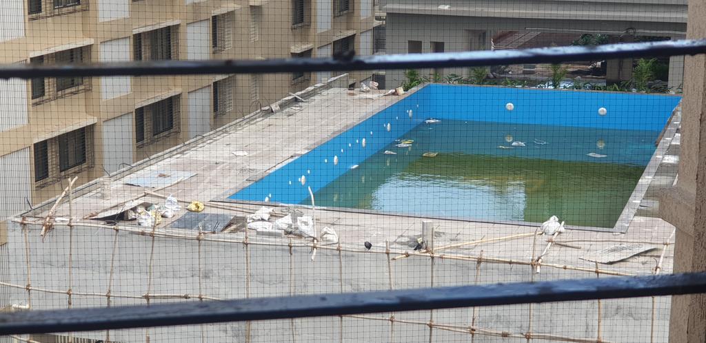 <a href="/TMCaTweetAway/">Thane Municipal Corporation - ठाणे महानगरपालिका</a>  please take action on the accumulated water of an under construction swimming pool. I already have a case of Dengue in my home.  Don't need a full epidemic in the society.
Location: Ashar Edge, Opp. Lok Puram