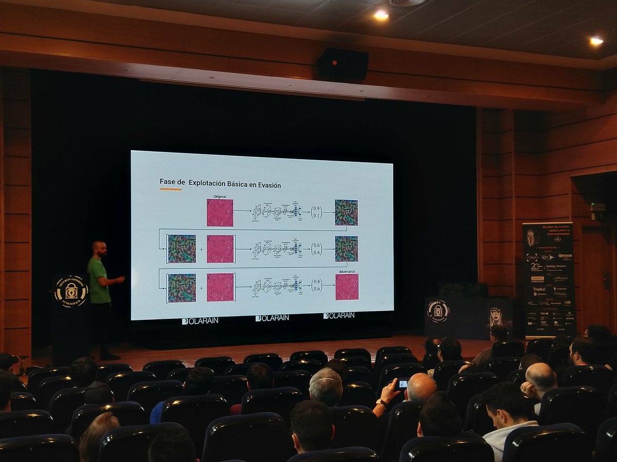 EuskalHack's tweet photo. Comienza la charla patrocinada de Vicomtech "Ciberseguridad en Deep Learning" de la mano de Xabier Echeberria #DeepLearning #RedTeam #Defense #ESCV @vicomtech https://t.co/spN4II3kzk