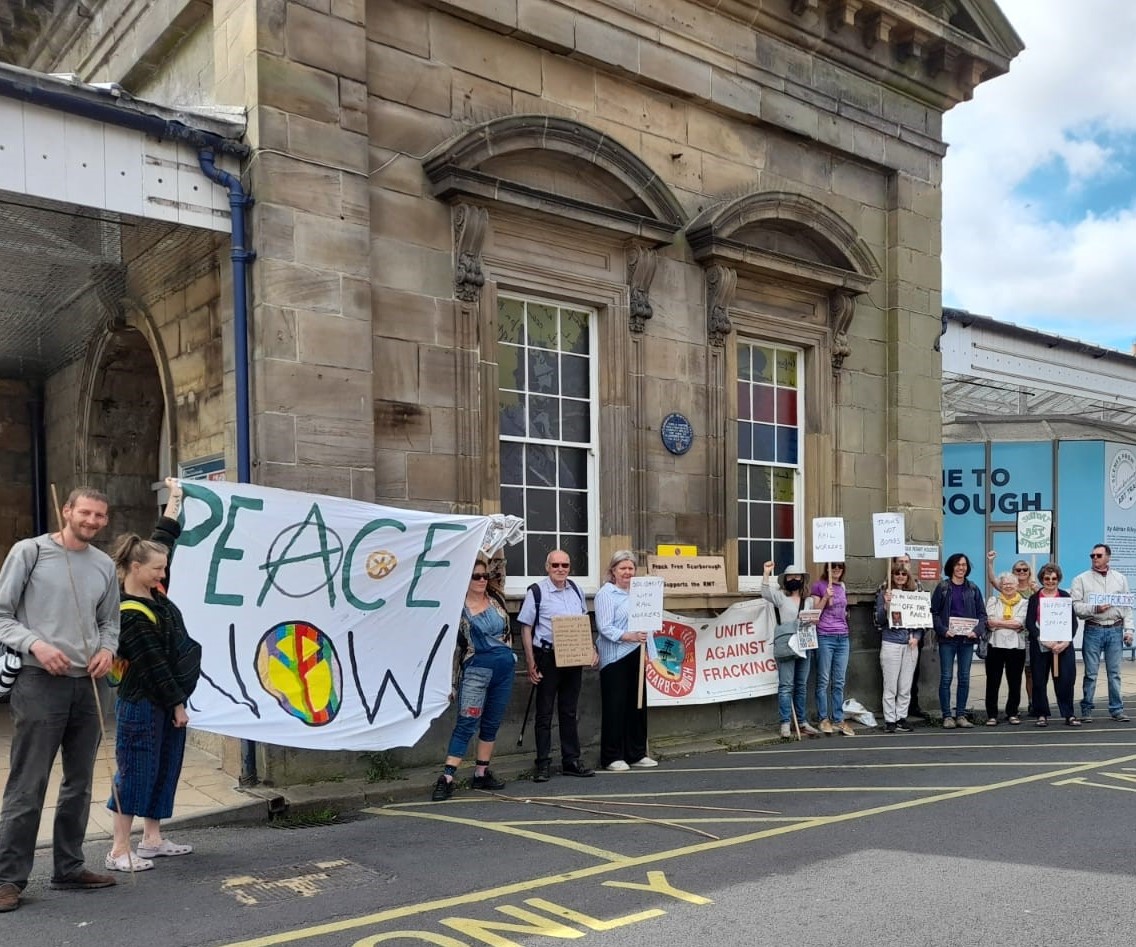 There was no RMT picket line in Scarborough today, so climate activists, peace activists and trade unionists mounted a solidarity picket. We collected £41 for the strike fund. Trains, not bombs! Public transport not climate change! <a href="/RMTunion/">RMT</a>
