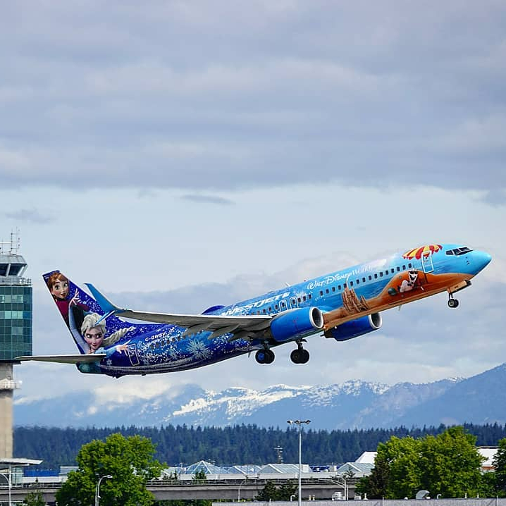 WestJet's tweet photo. Spotted: the #MagicPlane taking in the views from YVR. 😎 Thanks for the 📸, @EyeTrapper https://t.co/WycAEgTZz9