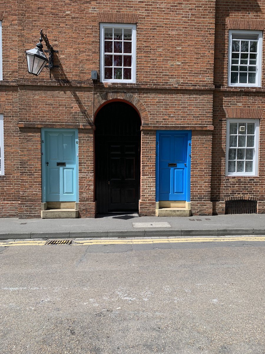 Love the colourful doors on this row of houses.