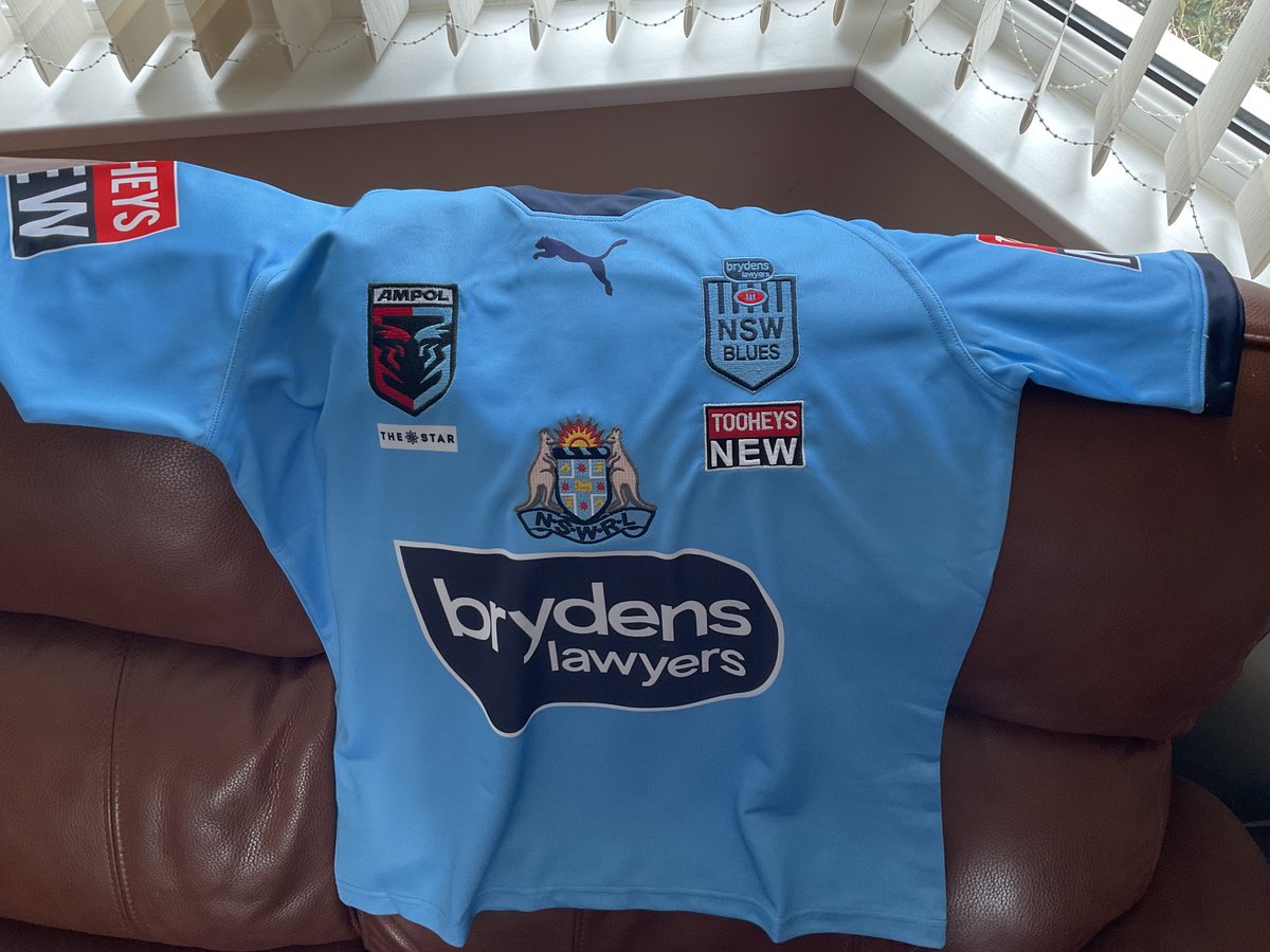 Walto74's tweet photo. I have the best wife, today arrived my ⁦@NSWBlues⁩  top it got to sunny UK just in time for tomorrow #origin2 buzzing, we are 2 very happy  English blues 😀 https://t.co/ksYyX2wfRy