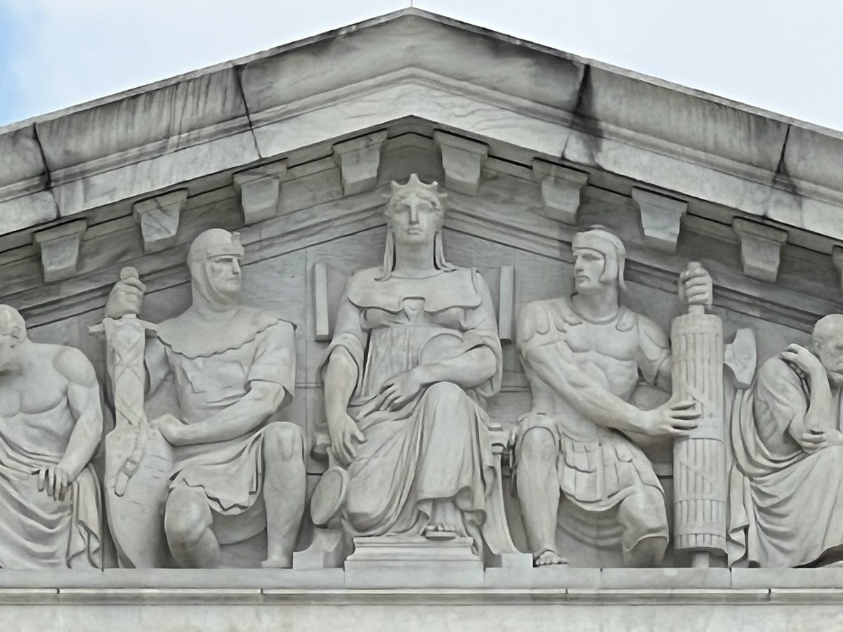 KevinLewisNomad's tweet photo. One female speaker drew the crowd's attention to law enforcement positioned on the roof of the U.S. Supreme Court.

"You're all mad because we want to protect our bodies? Ain't that some shi*!"

Black fencing surrounds the court grounds. It has been in place for many weeks now. https://t.co/b9khDtufc5