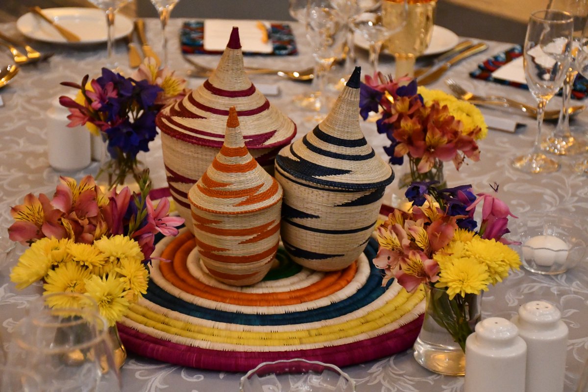 The centre pieces are traditional Rwandese woven baskets, known as ‘peace baskets’, which were woven by Irebe women using eco-friendly raw materials, like long grass from the swamps and mountains in Rwanda.

Irebe trains South Rwandan women in vocational skills, such as weaving.