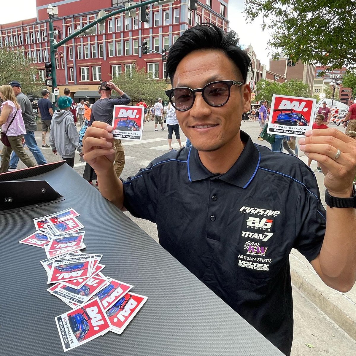ENEOSUSA's tweet photo. Scenes from @PPIHC Fan Fest with @DaiYoshihara and @EvasiveMtrsprts: huge turnout to support the 100th running of the hill climb! Weโre hyped and ready to compete!
#ENEOS | #DaiYoshihara | #EvasiveMotorsports | #PPIHC | #PitandPaddock | #Turn14Distribution | #Titan7Wheels https://t.co/7OfaefdioK