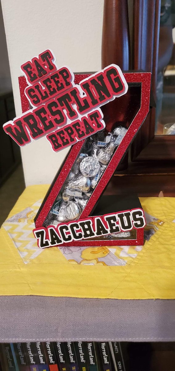 His auntie just loves him!! His going away gift!! Traveling prayers for our Pirate wrestlers!!