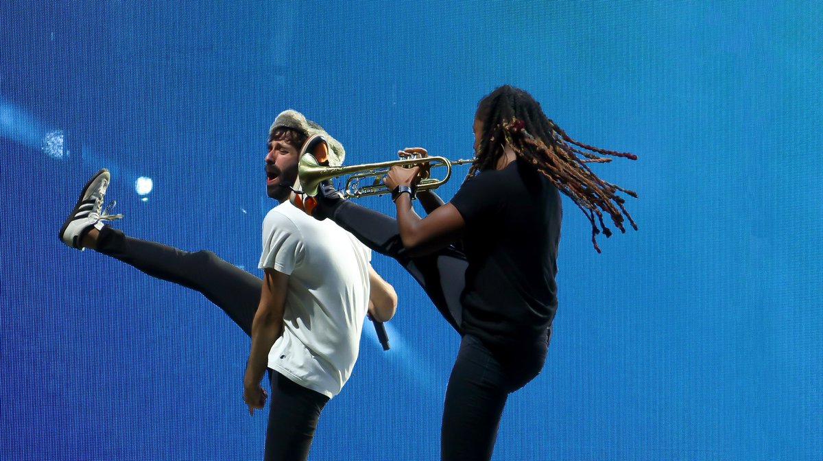 AJRTour's tweet photo. 📸: Arnetta onstage with AJR at #OKOPhoenix the other night!

📷 @Doctor_HooLock 
(please do not repost without credit!) https://t.co/rRTde654ms