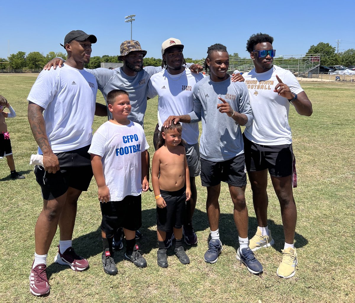 The boys had a blast this morning helping coach at the annual CFPO Youth Football Camp in San Marcos! 🏈

#TEAM  #EatEmUp