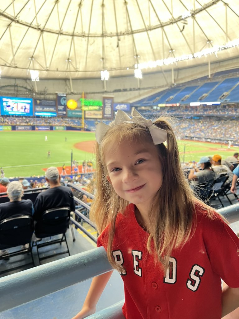 tribe30's tweet photo. Kyla’s first baseball game and even though we may be in Tampa Bay we still rep our @Reds https://t.co/c5z3Kf2sJu