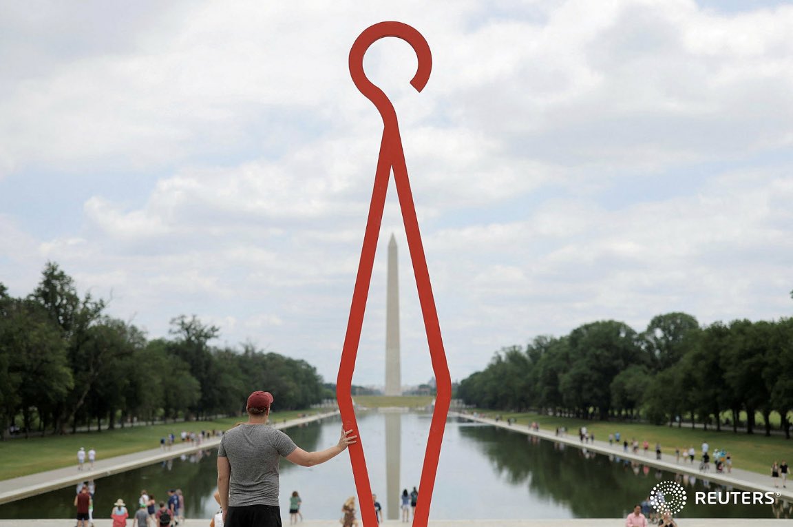 Abortion rights activist and artist Jon Mort, 38, stands in front of the Washington Monument with his piece titled "Gates of Hell" after the United States Supreme Court ruled in the Dobbs v Women's Health Organization abortion case, overturning Roe v Wade. REUTERS/Andrew Kelly