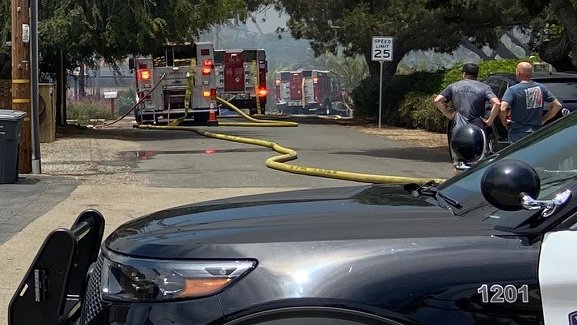 CarlsbadPolice's tweet photo. The fire has been contained. Please continue to stay clear of the area while we finish up. We will let you know when the roads reopen. https://t.co/sNpVpRRwVF