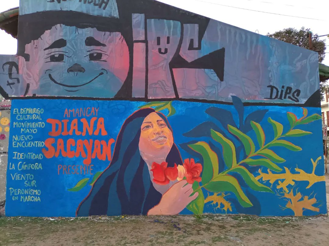 generosne_merlo's tweet photo. Junto a compañeres de otras organizaciones nos encontramos en la Plaza Solanet de Merlo para restaurar el mural homenaje a #DianaSacayan https://t.co/rlFzsPQevq