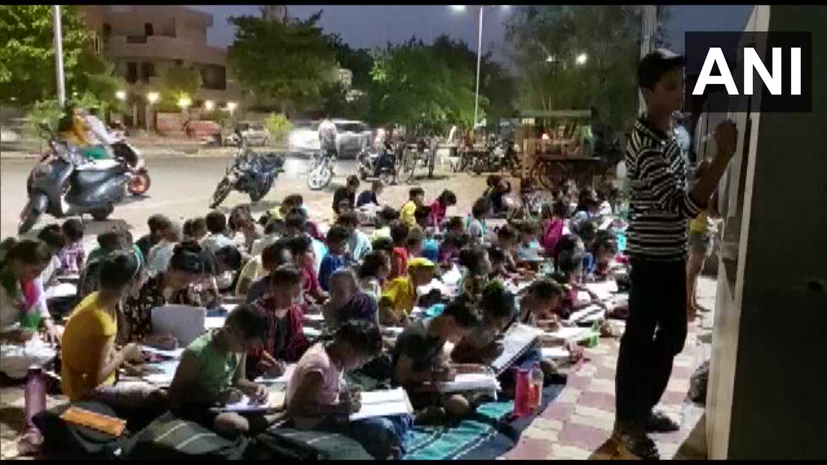 ANI's tweet photo. Gujarat: A civil engineer in Vadodara gives free education to children on a footpath

Around 95-100 children from KG to 10th std come here to study. Some of them go to govt/pvt schools but their parents can't afford tuition,so I teach them for free:Nikunj Trivedi, engineer(25.06) https://t.co/JMQg8ytAkz