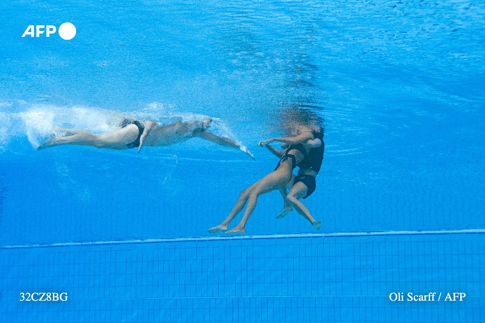 Oli Scarff’s heart-stopping photographs of Anita Alvarez losing consciousness as she took part in the World Aquatic Championships moved millions around the world. This is the story behind the photographs and the @AFP technology that made them possible ➡️ bit.ly/3HPHAg1