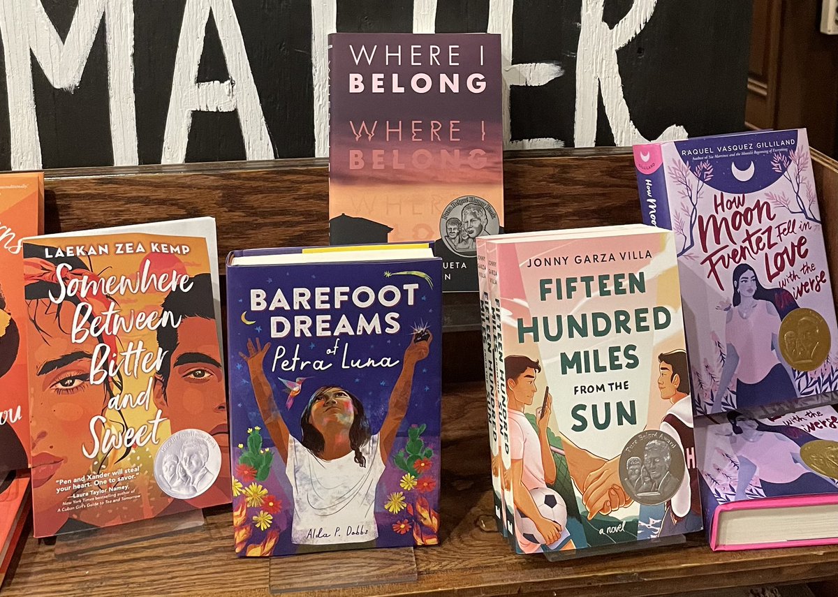 I had dinner with the fabulous @LernerBooks authors and staff last night at @busboysandpoets in DC and saw this lovely display of books. So happy to be on a shelf with fellow @LasMusasBooks @JONNYescribe @LaekanZeaKemp @poet_raquelvgil and Alda Dobbs.