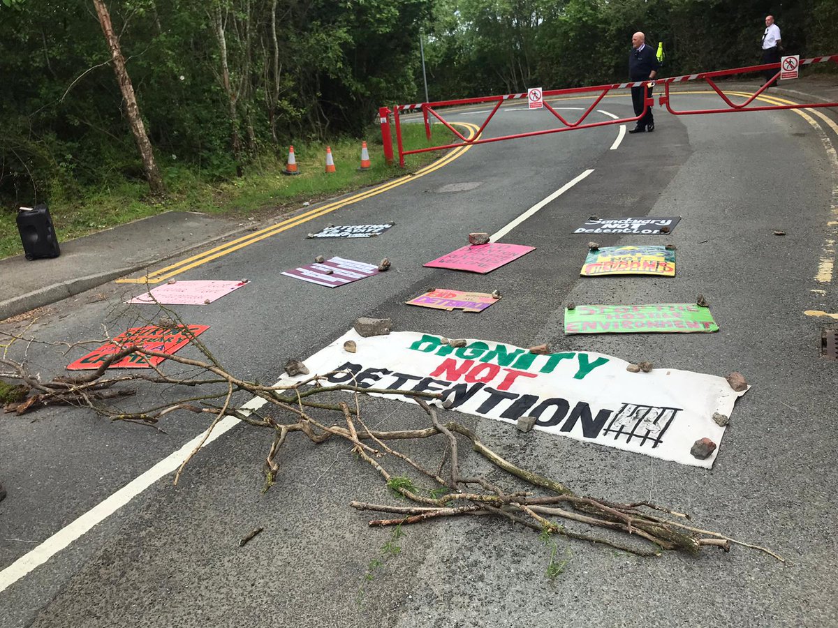 EndHassockfield's tweet photo. Protesters at Derwentside IRC block a van taking women in detention. Solidarity with all people affected by this cruel system. #StopDetention #StopDeportations #NoBorders #SetHerFree https://t.co/S4tFIatqLw