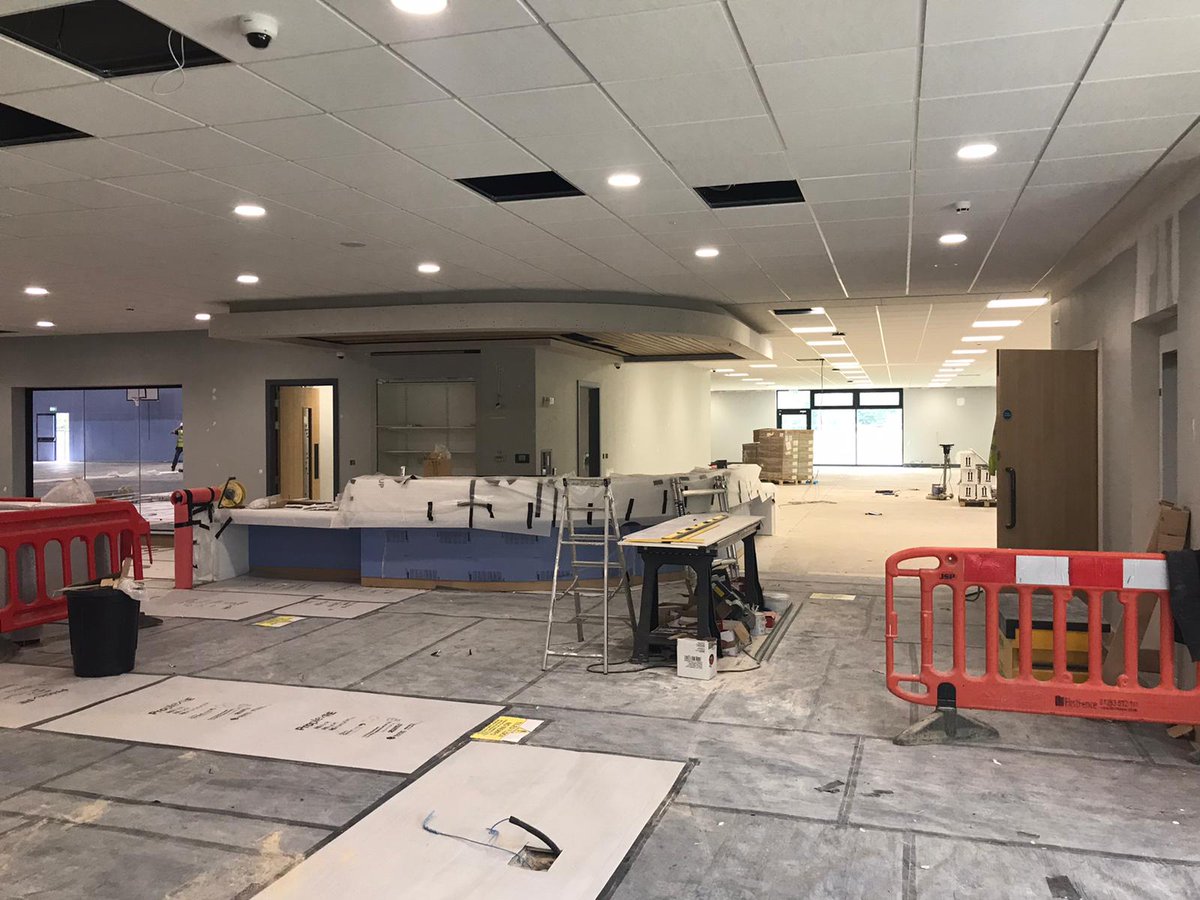 CampusMelksham's tweet photo. Continued progress at the Melksham Community Campus site.  All coming together nicely.  Sports hall fit-out; Wet change nearing end stages; Group exercise studio light testing, and Reception desk installed.  @Sport_England https://t.co/9x7stVuLQr
