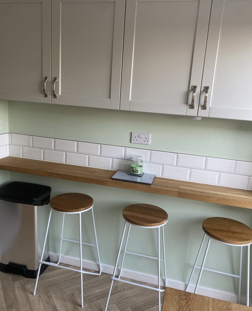Sometimes less is more and you don’t have to fill a room with tiles for them to serve a purpose. Just a small tiled area can add a stylish and practical element to a room. This breakfast bar area has a wipe clean splash back protecting the wall with a classic brick style look.