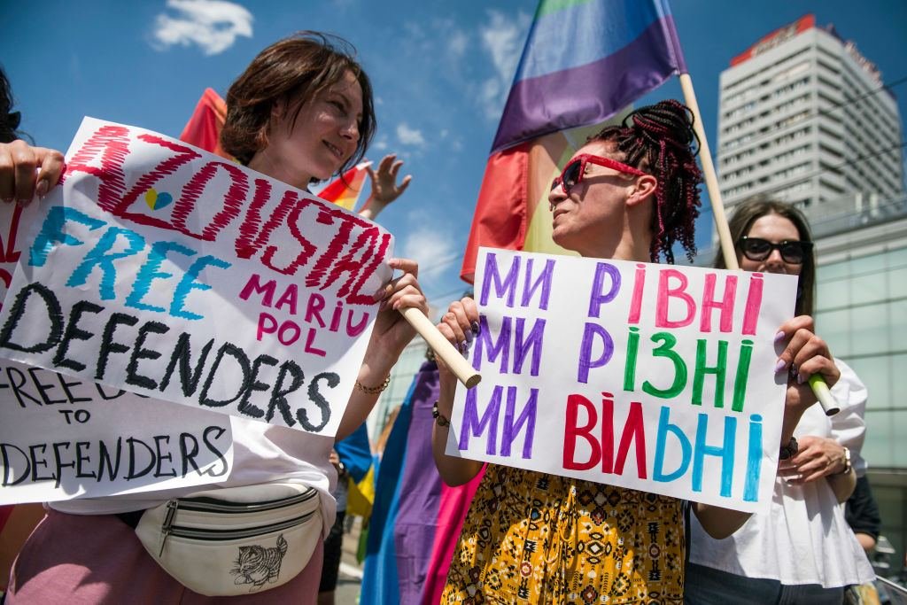 FreepleGov's tweet photo. Warszaw, 25 of June 2022. Pride parade to support people of Ukraine &amp; defenders of Azovstal. The girl on the right side holds a poster with the words: "We are equal, we are different, we are free".  #BBCYourQuestions #UkraineLetMenOut (1/3) https://t.co/3sGcZ3pM2k