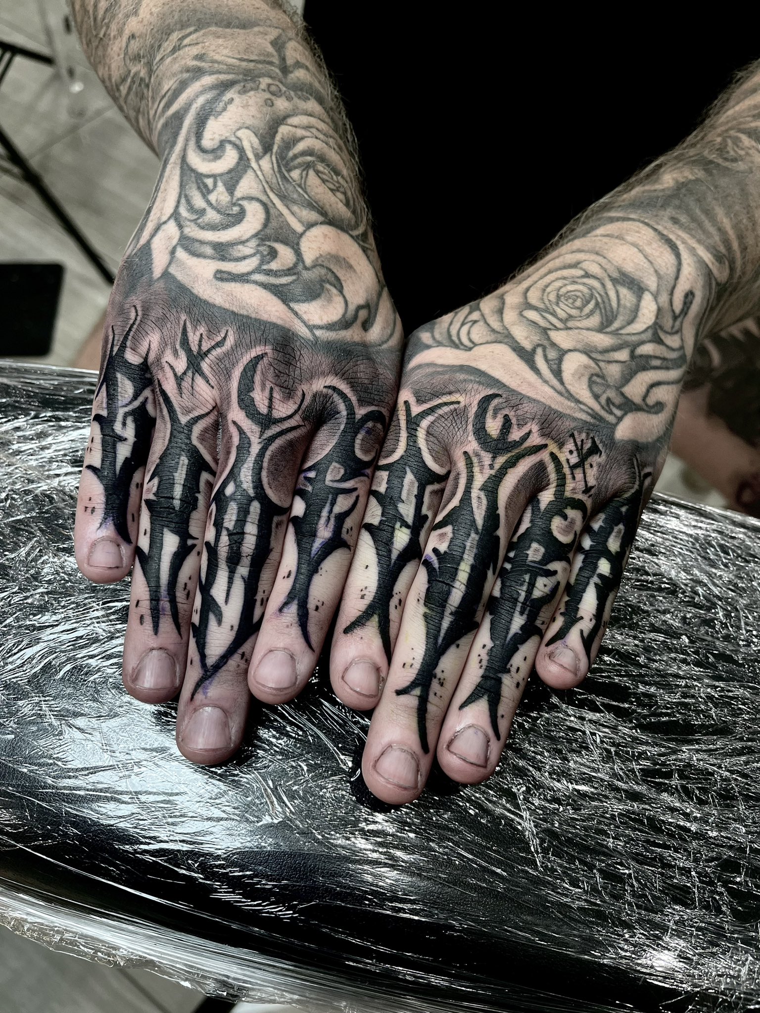 Tattoo uploaded by Xavier  Blackwork finger tattoo by OilBurner  OilBurner blackwork metal dark gothic handstyle metal  Tattoodo