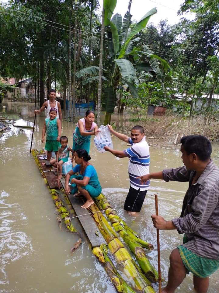 RSS volunteers are providing drinking water, biscuits and other essential commodities to flood affected people in Assam.