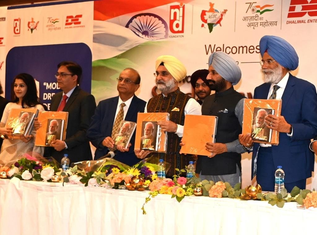 ANI's tweet photo. India's Ambassador to the US, Taranjit Singh Sandhu attended the Sadhbhavana event in Chicago today. He launched two books on PM Modi at the event which was also attended by several dignitaries, including Sri Sri Ravi Shankar. https://t.co/3Xzj5RawfT