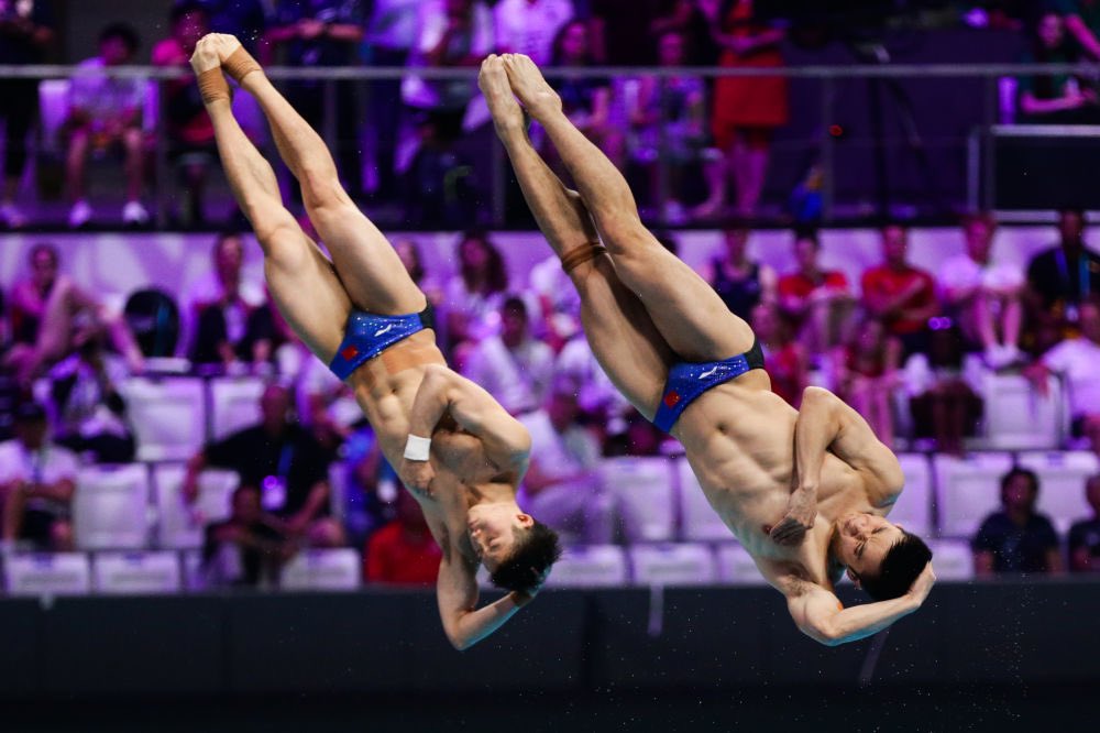 FocusChinaEN's tweet photo. World Swimming Championships | Cao Yuan / wangzongyuan won the men's doubles 3m springboard and won the first gold in diving https://t.co/qkg94hLpS7