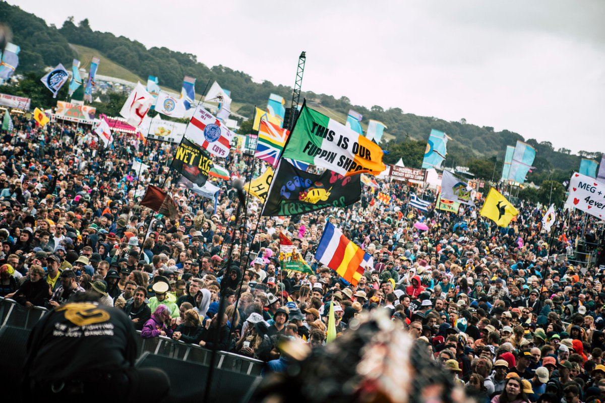 idlesband's tweet photo. What a gift to be at the best place on earth. The wait disappeared from memory as we looked out at all we are grateful for. Thank you, @glastonbury. https://t.co/4ySfJyDvNZ