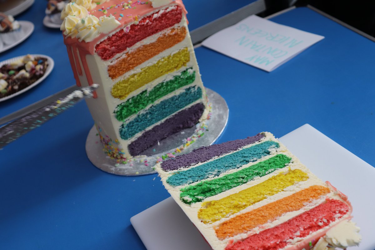 TaverhamHigh's tweet image. A fantastic start to our @NorwichPride #prideschoolsweek events with a break time bake sale in the atrium, featuring the baking skills of @MissClifford11, the Pride Group, and the Diversity Ambassadors! #cakes #rainbowcake #proud