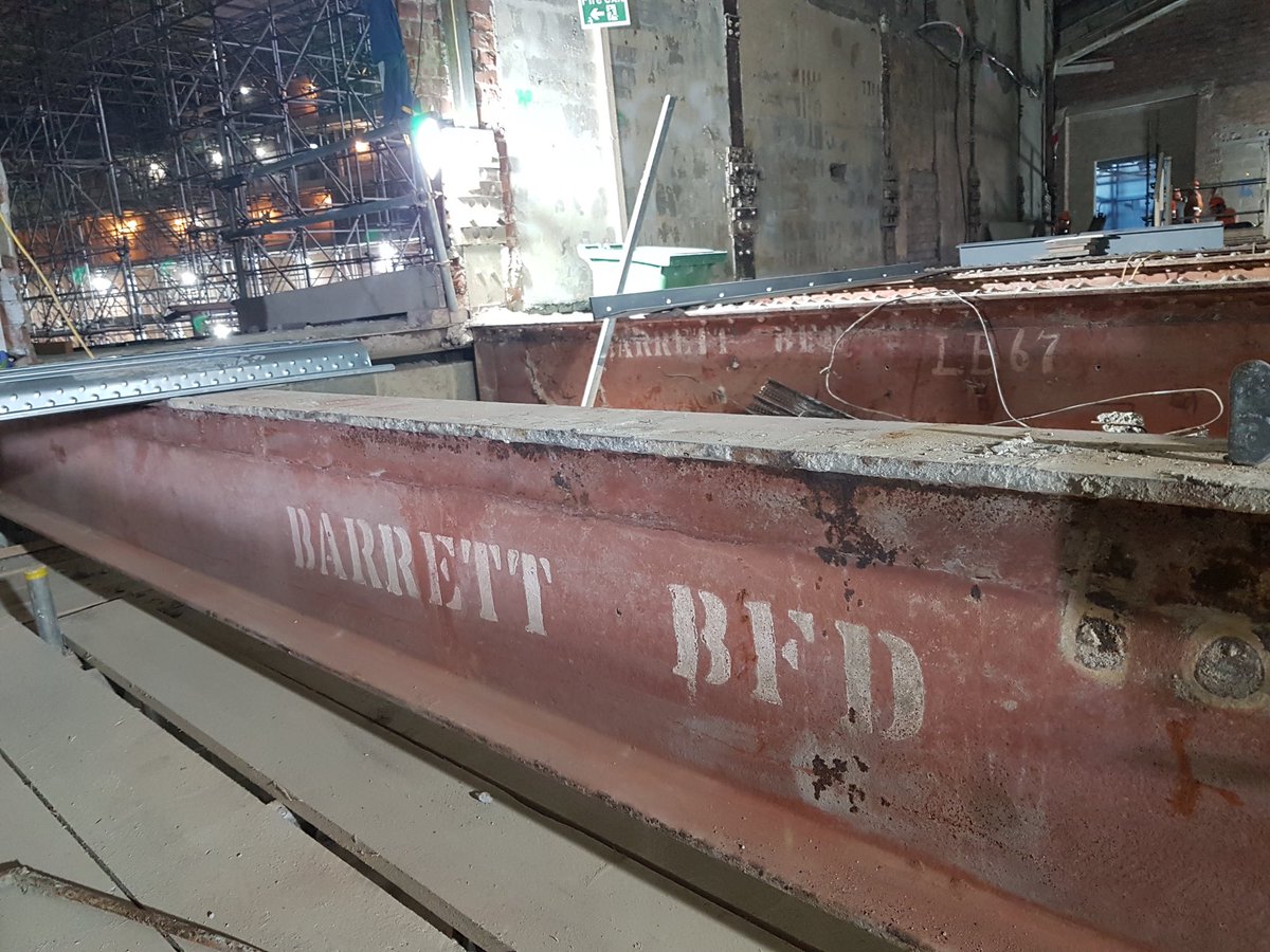 After removing the decayed concrete planks of the first floor, we are left with these massive steel beams.  Still in good shape, with the name of the supplier, Barrett Steel of Bradford (still going strong today) looking fresh, even after 90 years!